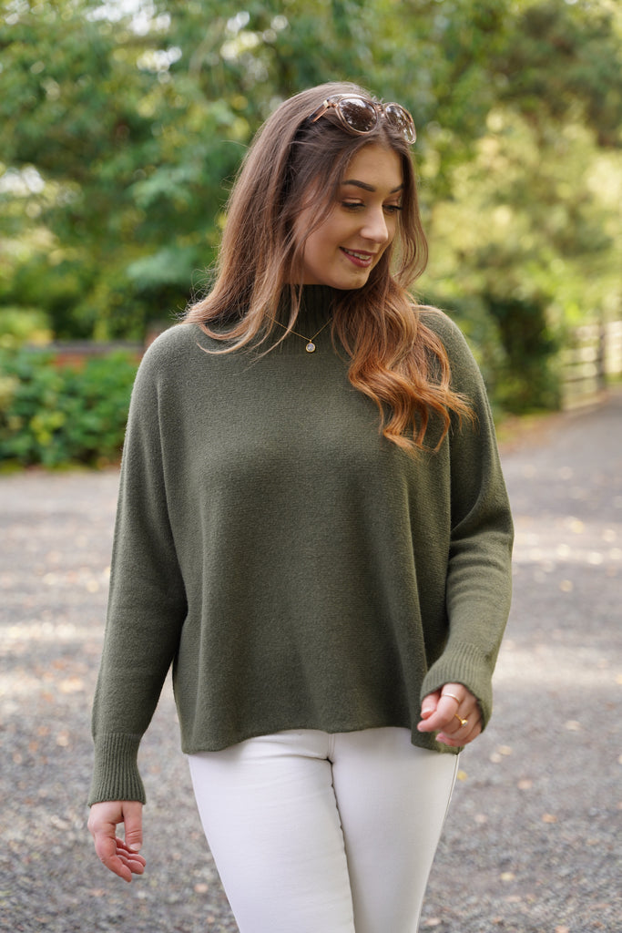 High neck jumper in green 