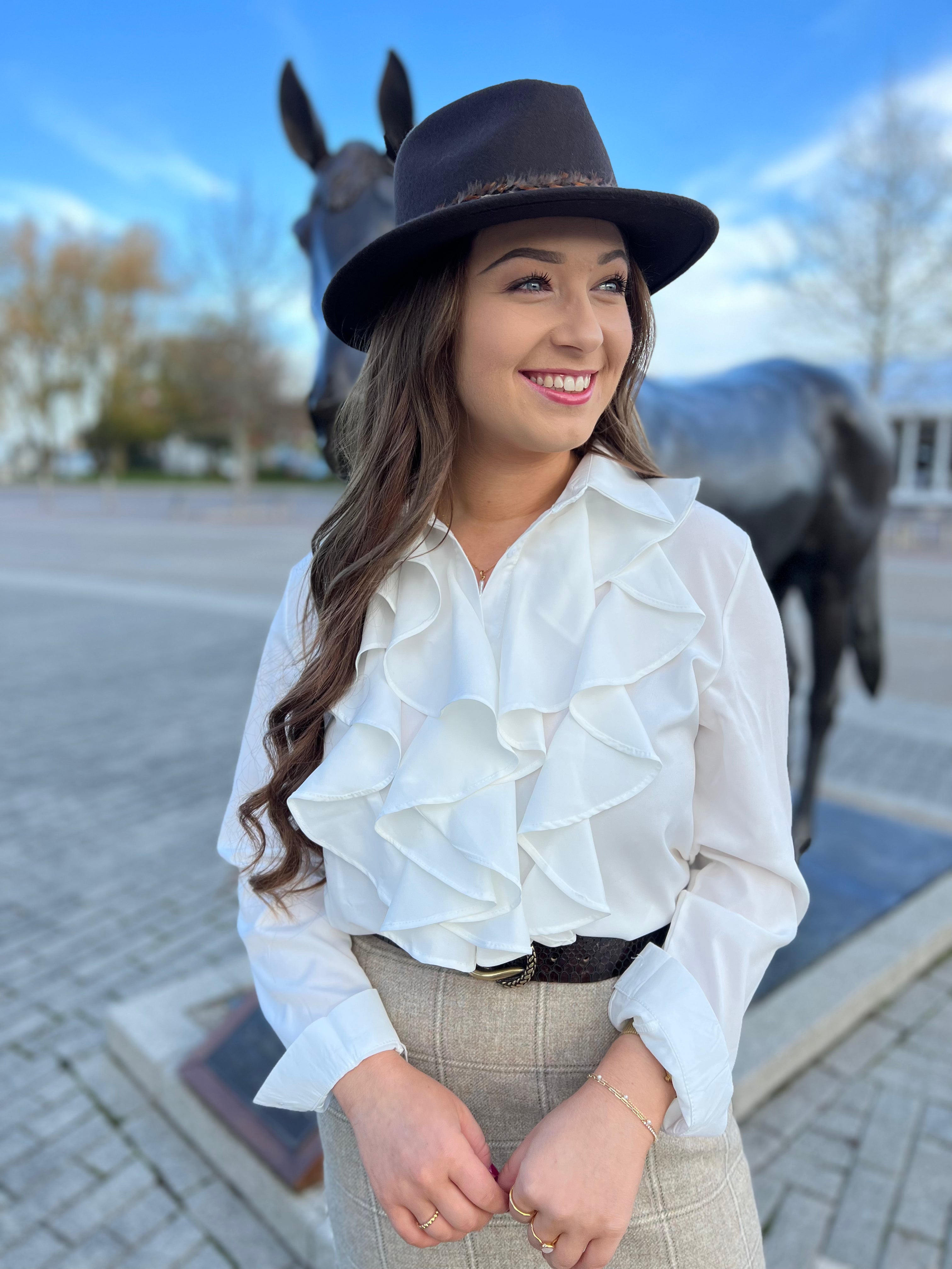 White ruffle blouse uk hotsell